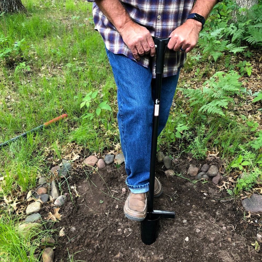 step on lower bar to plunge spades into ground and create hole
