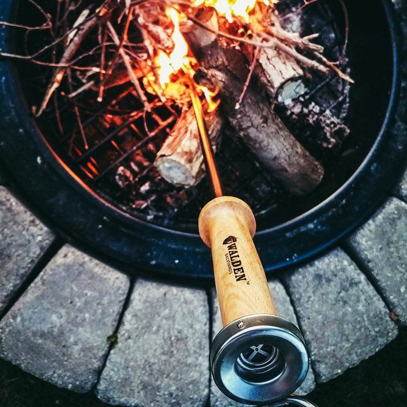 Walden blow through stoker poker sticking out of outdoor fire pit